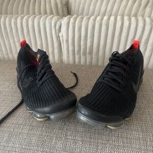 Black and Red Athletic Shoes with Breathable Knit Upper